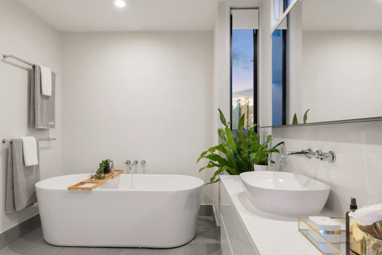 A finished bathroom with a freestanding tub